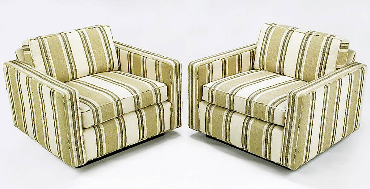 Pair of comfortably large club chairs from the 1960s, in the original striped wool upholstery in cream, tan, taupe and gray. Slightly larger version of similar cube chairs by Charles Pfister, Harvey Probber, and Florence Knoll. The larger size mixes