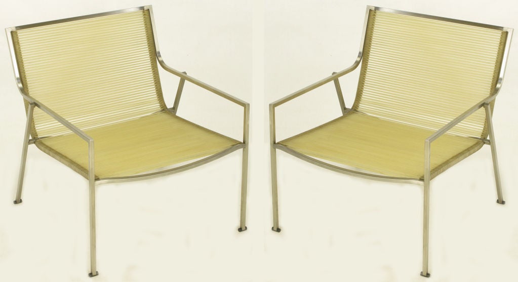 Pair of iconic Italian design outdoor or indoor lounge chairs by Giandomenico Belotti.  Brushed aluminum bar frames with high density rubber straps that resemble 