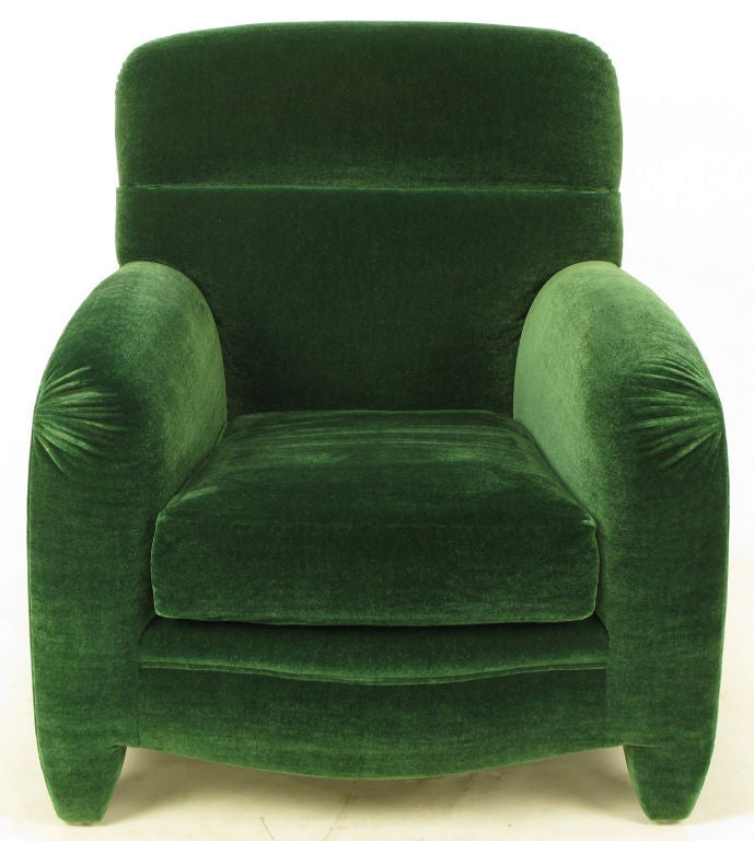 Art Deco revival club chair by Donghia, most likely a John Hutton design. A reinterpretation of the French Deco club chairs of the 1930s with sloped arms and a slight recline to the back. Fully upholstered in the original Donghia emerald green
