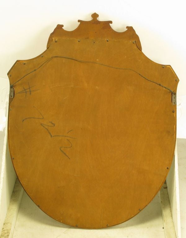 Mid-20th Century Carved Walnut Shield-Form Empire Ribbon & Acanthus Leaf Mirror For Sale