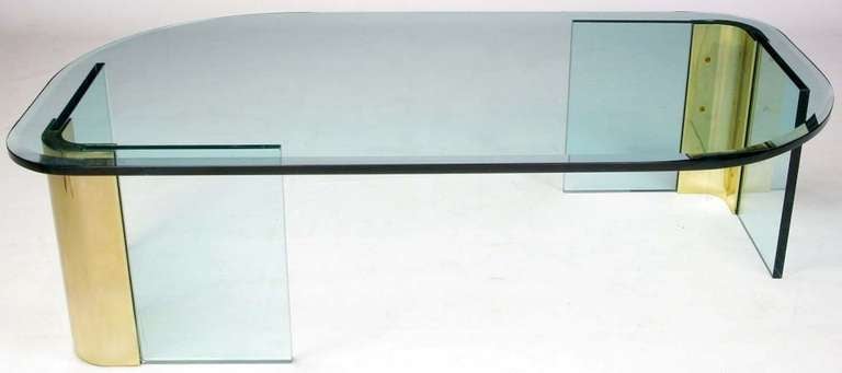 Asymmetrical thick glass coffee table with bases of two vertical 3/4