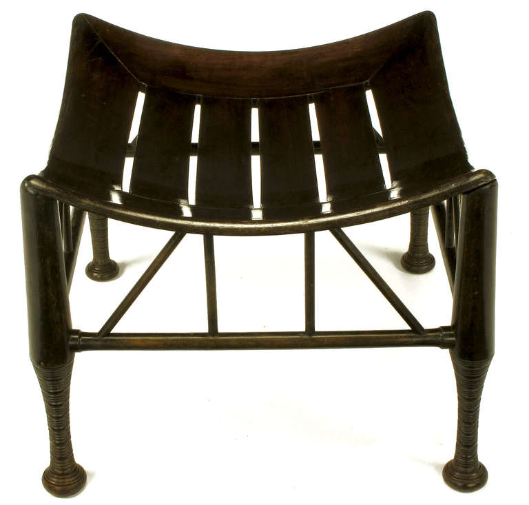 Thebes style stool, derived from an ancienet Egyptian piece and patented by Leonard Wyburd of Liberty &Co.

The 