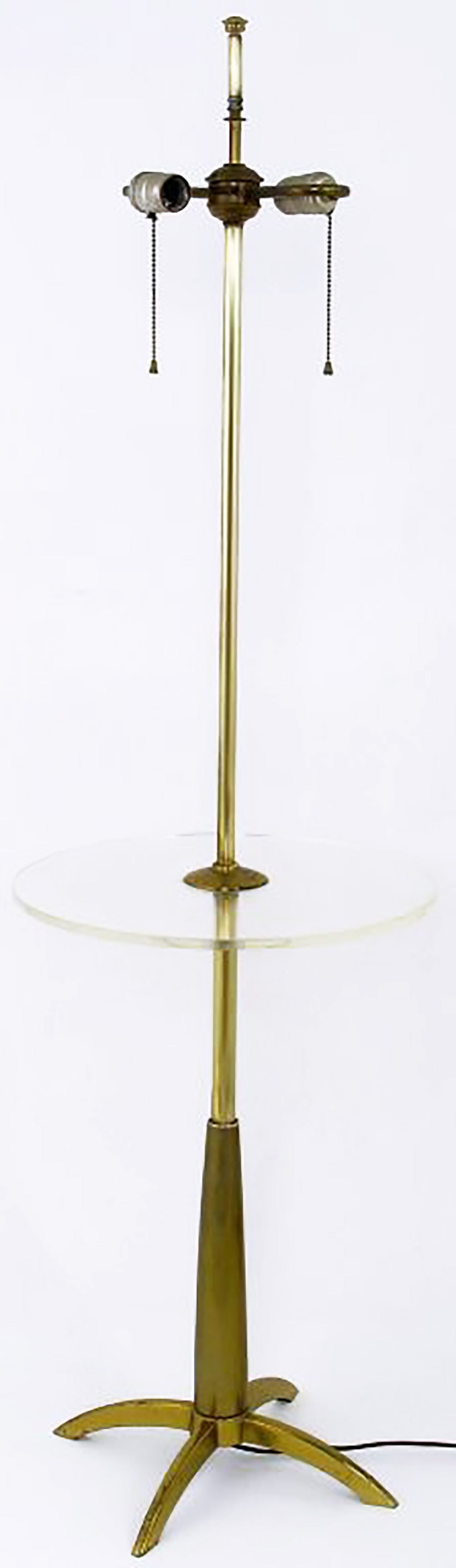 Modern floor lamp in brass with a round clear acrylic tabletop by Stiffel. Solid brass base with four arched legs and dual lighting elements with Classic pull chain switches. Sold sans shade. 

Custom shade of the same size and similar materials