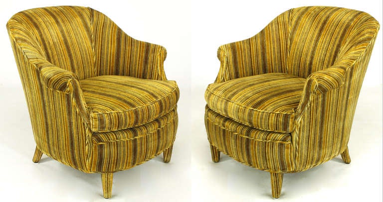 Pair of barrelback club chairs, fully upholstered in a silk velvet stripe of brown, yellow and orange. Uncommon roll to the arm where it meets the sloped shoulder (see image 6). Could possibly be a Richard Himmel design for Interior Crafts.