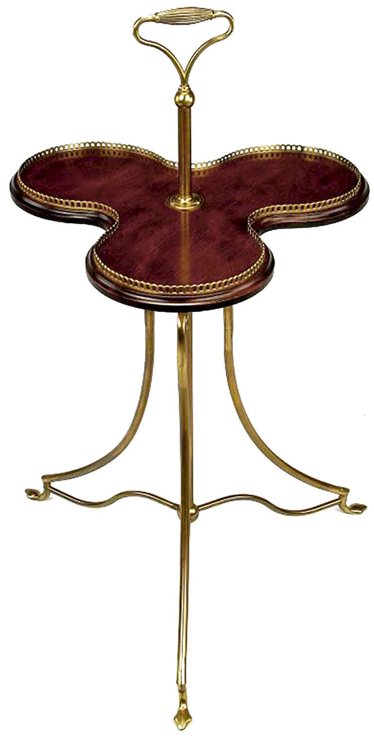 A beautifully executed replica of an 1880s English revolving confection server in mahogany and brass. The tray rises on a post for serving. Certificate of historical accuracy by Jack Patla, AADLA.