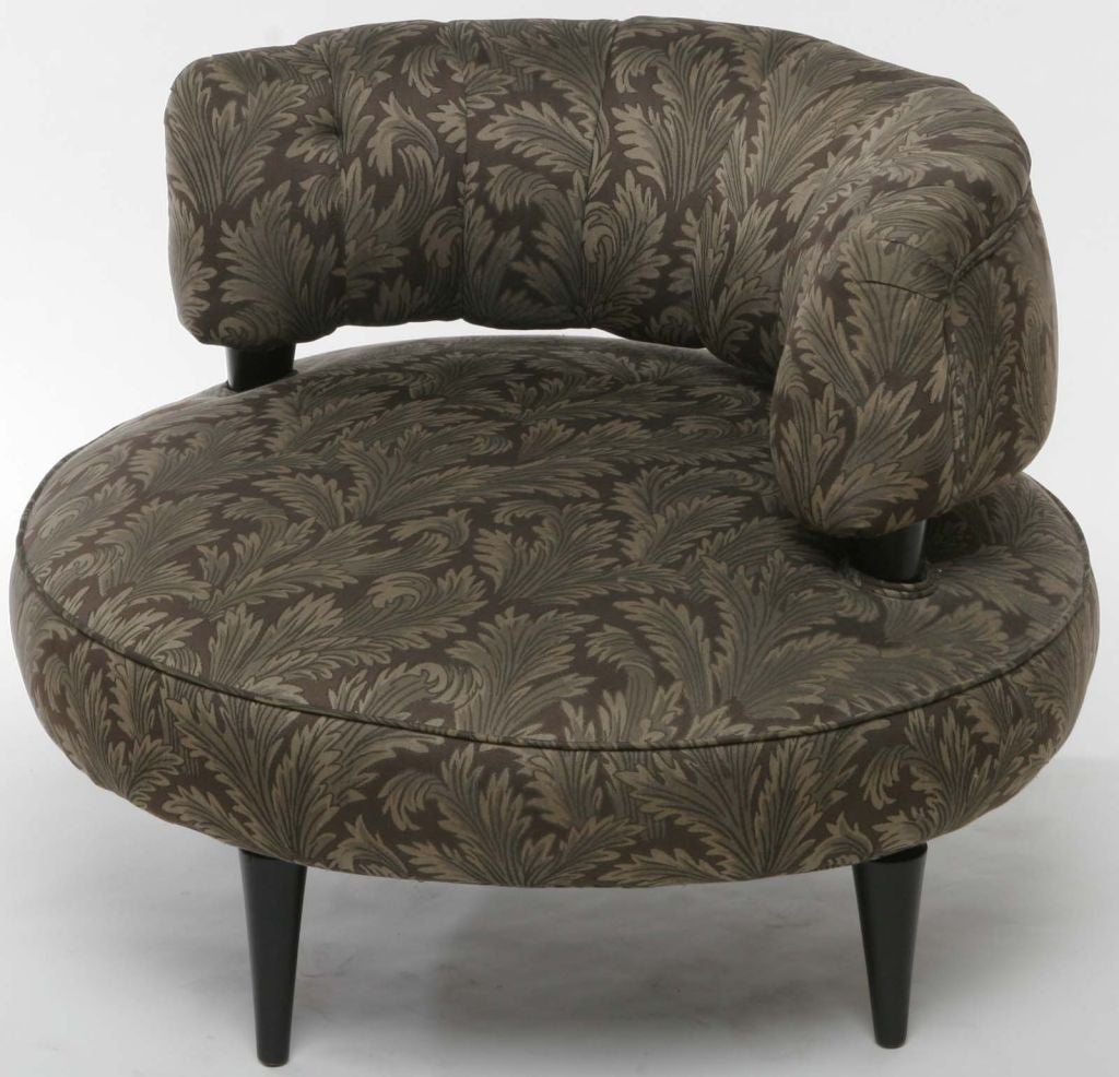 Originally purchased at the Carson Pirie Scott and Company department store on Chicago's State Street in the 1940s. Recently reupholstered in black, gray and taupe fabric, with ebonized wood legs and back supports.