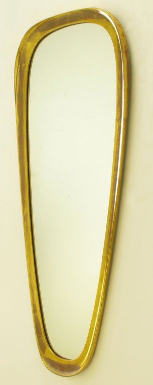Unusual LaBarge mirror in an abstract oval shaped gilt wood frame imported from Atelier Armand Dutry, Belgium. Atelier Armand Dutry was very high quality supplier of the finest gilt frames both large  and small. This particular mirror was marketed
