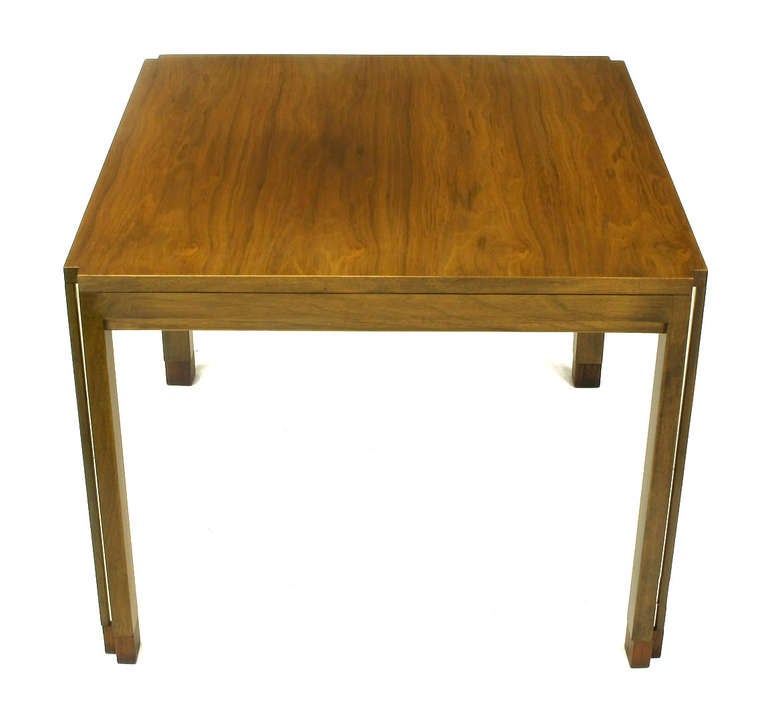 Edward Wormley figured walnut Parsons style side table with unusual aluminium inlaid legs. Incised corners start at the top and move all the way down the legs with aluminium inlay. Recessed apron and rosewood feet.