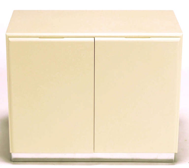 Lacquered Milo Baughman Ivory Lacquer and Chrome, Two-Door Cabinets with Corner Pedestal