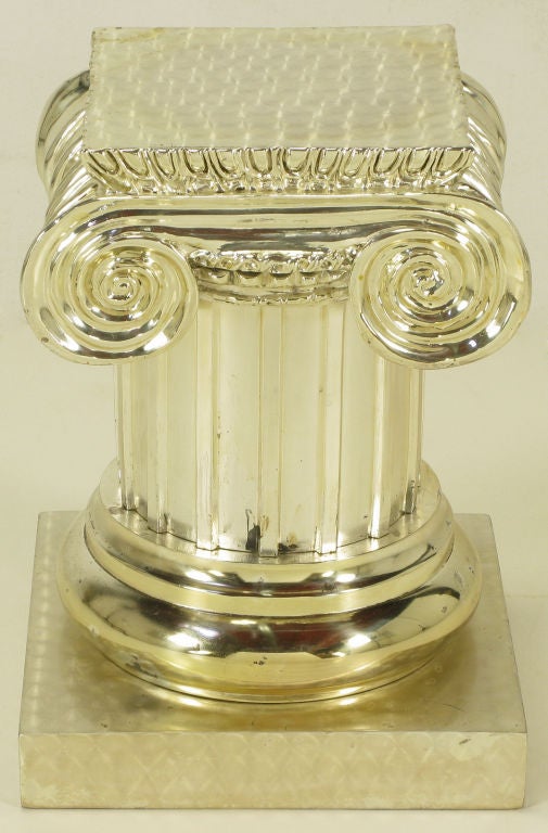 Engine turned and silverplated metal Ionic fluted column capital pedestal.