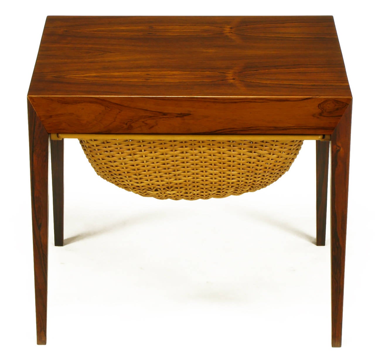 Rosewood Danish side table designed by Severin Hansen and manufactured by Haslev. Originally used as a knitting or sewing storage and work table, manufactured in Denmark. Would make an uncommon end table with a compartmental drawer and cane woven