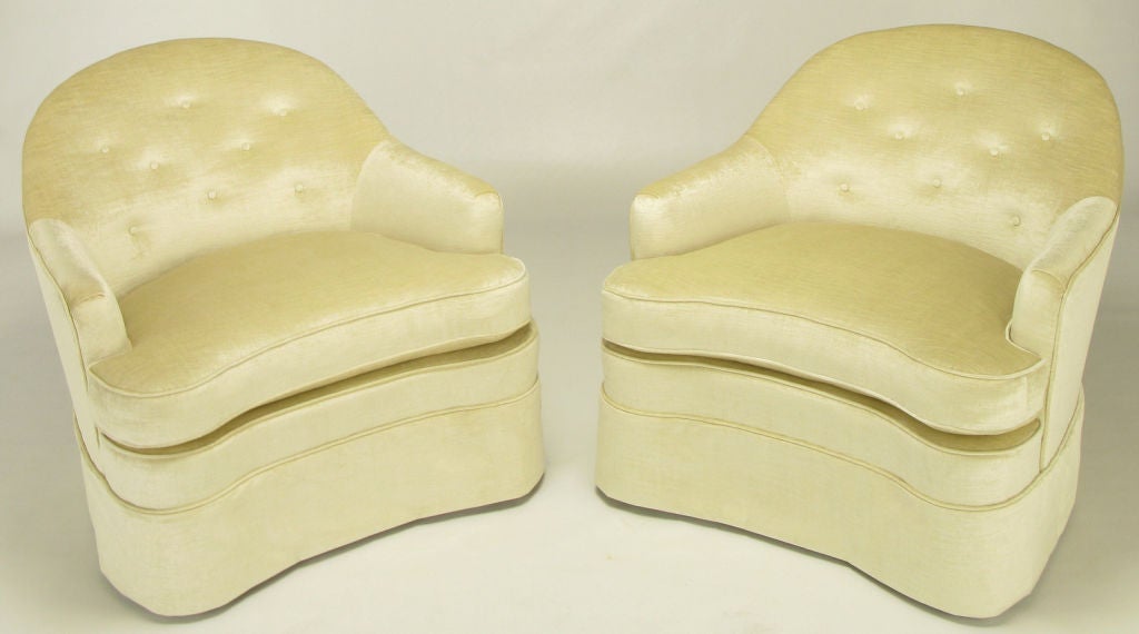 Elegant and rare pair of Dorothy Draper Viennese Collection for Henredon lounge chairs. Completely restored with ivory silk velvet upholstery and loose button tufted back cushions with exact pattern button tufted backs. Sculpted front with one-piece