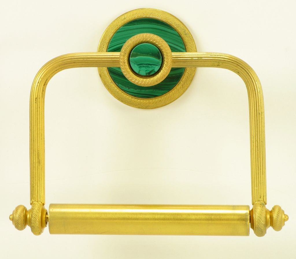 Vintage Sherle Wagner gold plated bronze bathroom paper holder with malachite center medallion and malachite escutcheon.