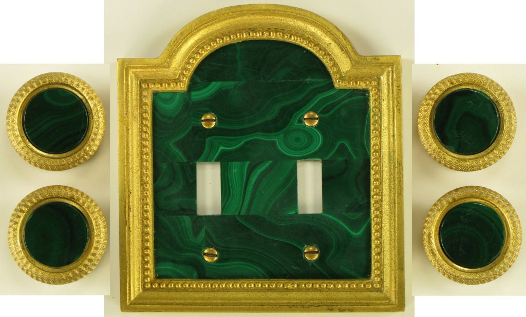 Vintage Sherle Wagner gold plated cast bronze and malachite Palladian arch top switch cover with beaded detail. Sold with four matching Sherle Wagner gold plated bronze and malachite dimmer knobs<br />
<br />
Set of four vintage gold plated cast