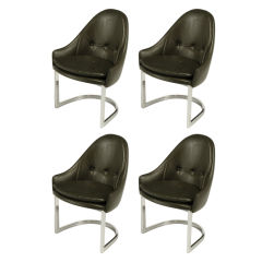 Four Cantilevered Chrome Spoonback Dining Chairs