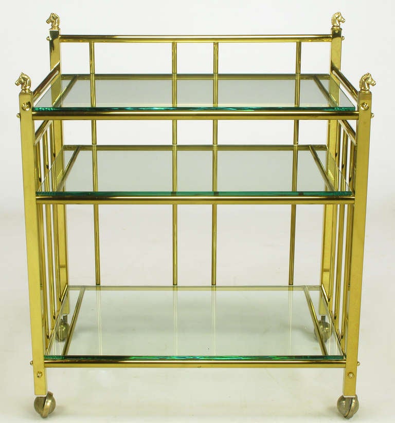 Elegant brass square stock bar cart or serving cart with equine head finials to the four corners. Thick 3/8