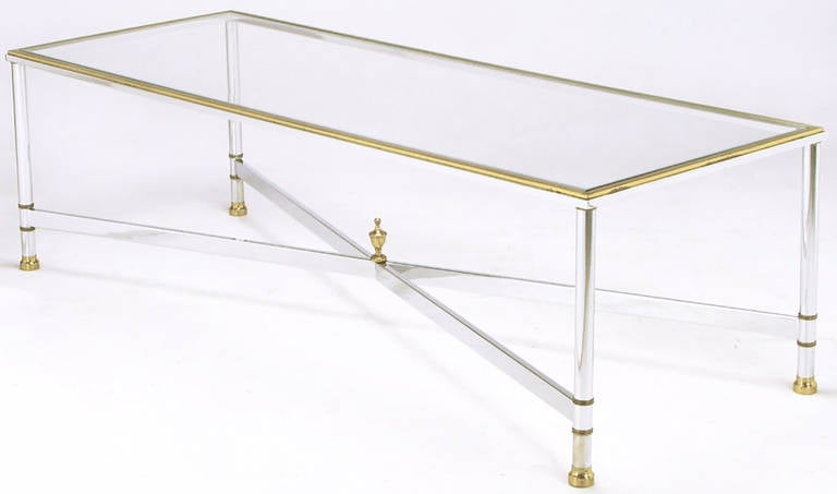 Versatile chrome and brass rectangular coffee table in the style of Maison Jansen. 