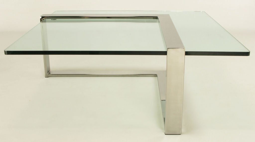 Cantilevered coffee table with and architectural L shaped chromed steel base and cantilevered 3/4