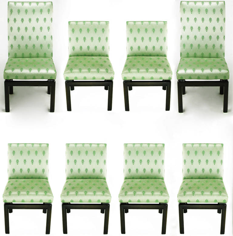 Wonderfully upholstered set of eight ebonized walnut chinoiserie dining chairs from Baker Furniture's 