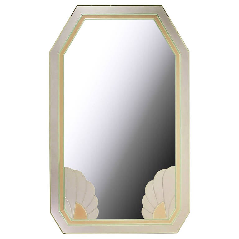 A more modern example of the Art Deco style, this unusual mirror has etched designs, delicately colored in light lavender and rose. Reminiscent of some work of Max Ingrand.