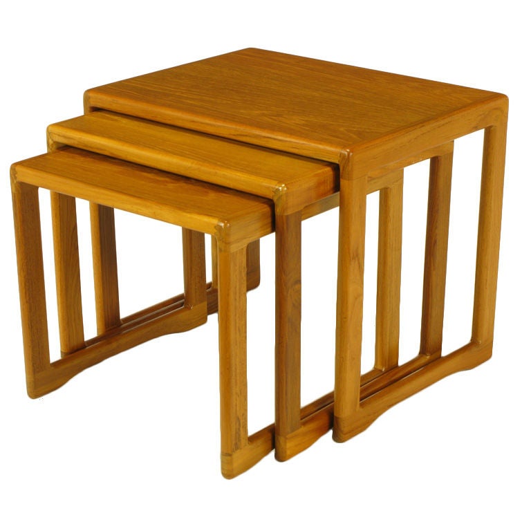 Three Teak Wood Sled-Base Nesting Tables For Sale