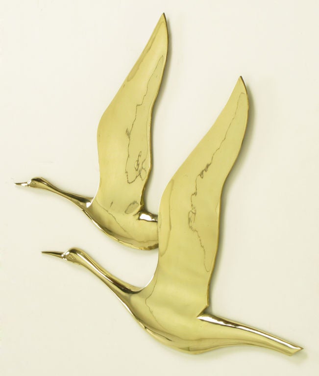 American Hanging Solid Brass Relief Of Two Herons In Flight For Sale