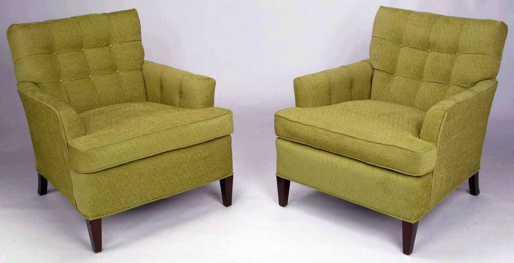 Description: Excellent pair of vintage Heritage-Henredon classic club chairs. Newly reupholstered in a diamond quilted sage wool, maintaining the button tufted arms and seat back of the original styling. Clean, understated legs have been refinished.