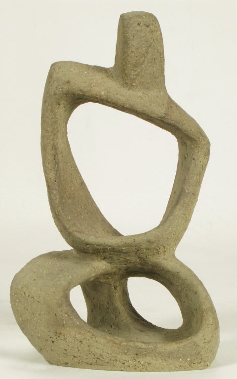Unglazed ceramic abstract sculpture in a biomorphic form.

Hoffman was a respected artist, and professor of ceramics and sculpture at the Art Institute of Chicago and Loyola University. Born 1920, Roswell, NM.  Attended School of the Art Institute