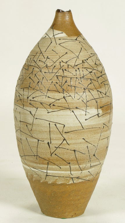 Free edge hand thrown terra cotta vase with taupe banded glaze and black glazed abstract detail. From the collection of William Hoffman, a professor at the Art Institute Of Chicago in the 1960s.