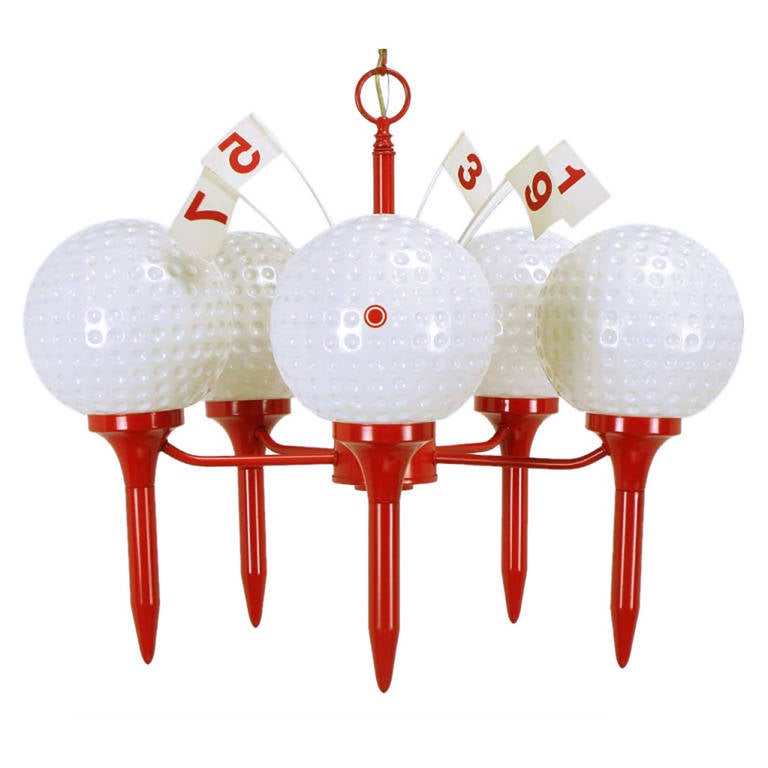 Unusual and striking golfer's dream chandelier. Red lacquered metal frame in the shape of golf ball tees connected by arms to the center post. Globes are dimpled heavy glass golf balls. In the center disc are five flags numbered 1, 3, 5, 7 & 9. 