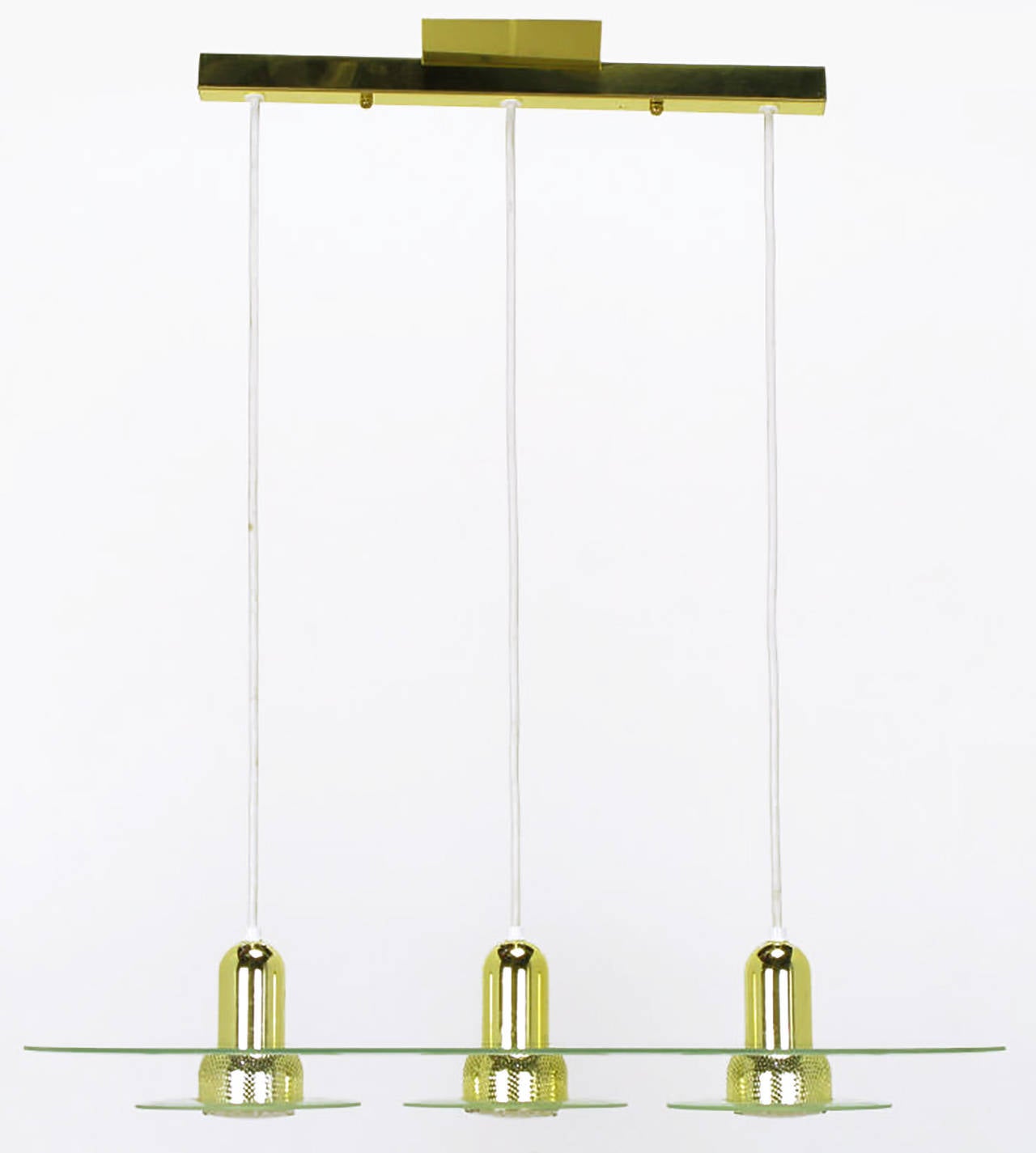 Postmodern three-light brass pendants with etched glass round bobeches and larger race track oval etched glass surround. White corded electrical cable connects to the brass long tray canopy. Perfect for a kitchen island, breakfast nook or pool table.