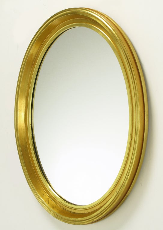 American Oval Light and Dark Gilded Wall Mirror For Sale