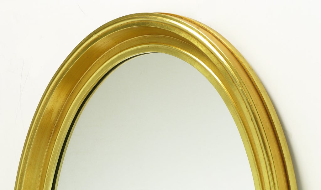 Mid-20th Century Oval Light and Dark Gilded Wall Mirror For Sale