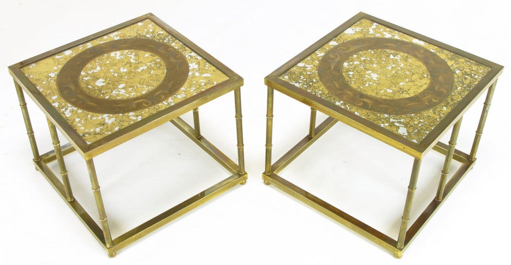 Mastercraft open box form side tables constructed of six solid brass faux bamboo legs, brass square base and brass framed square glass top. Reverse gilt and distressed mirror and circular patterned copper leafed etched filigree detail. Would make a