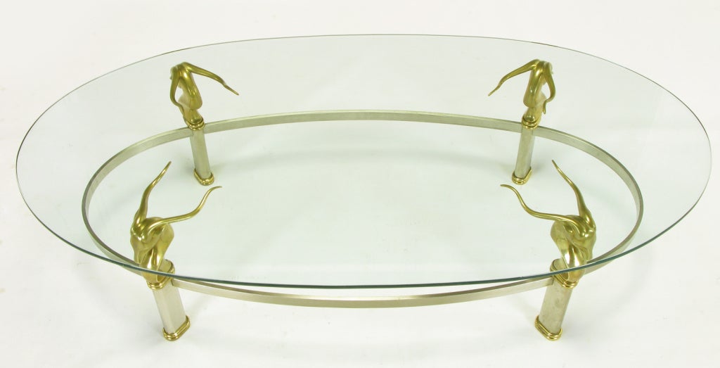 American Brushed Stainless Oval Coffee Table With Brass Gazelle Heads For Sale