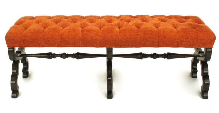 John Widdicomb long trestle bench with carved curule legs and and a pair of turned spindle stretchers. Button tufted seat upholstered in a persimmon chenille.

For best price and shipping options, please contact us directly at 312-234-9200 or