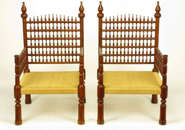 Beautiful carved teak wood and woven patterned rush seat arm or throne chairs with Moroccan styling. Also available with seat and back cushions. 

For best price and shipping options, please contact us directly at 312-234-9200 or