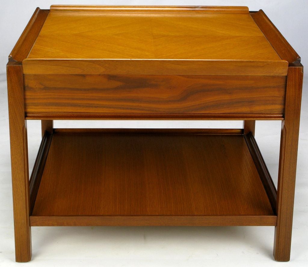 A very special side table, by Widdicomb Furniture, post-T.H. Robsjohn-Gibbings. It features an ash rift-cut, diamond-shaped parquetry top, surrounded by a wooden gallery edge, and a single drawer for storage.