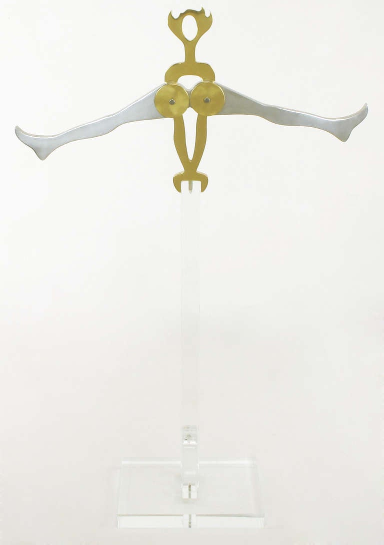 Brass and polished aluminium sculpture of a gymnast mounted on an acrylic stand by sister collaborators Arleen Eichengreen and Nancy Gensburg. Number 7 in a series of 8. Signed under right leg.