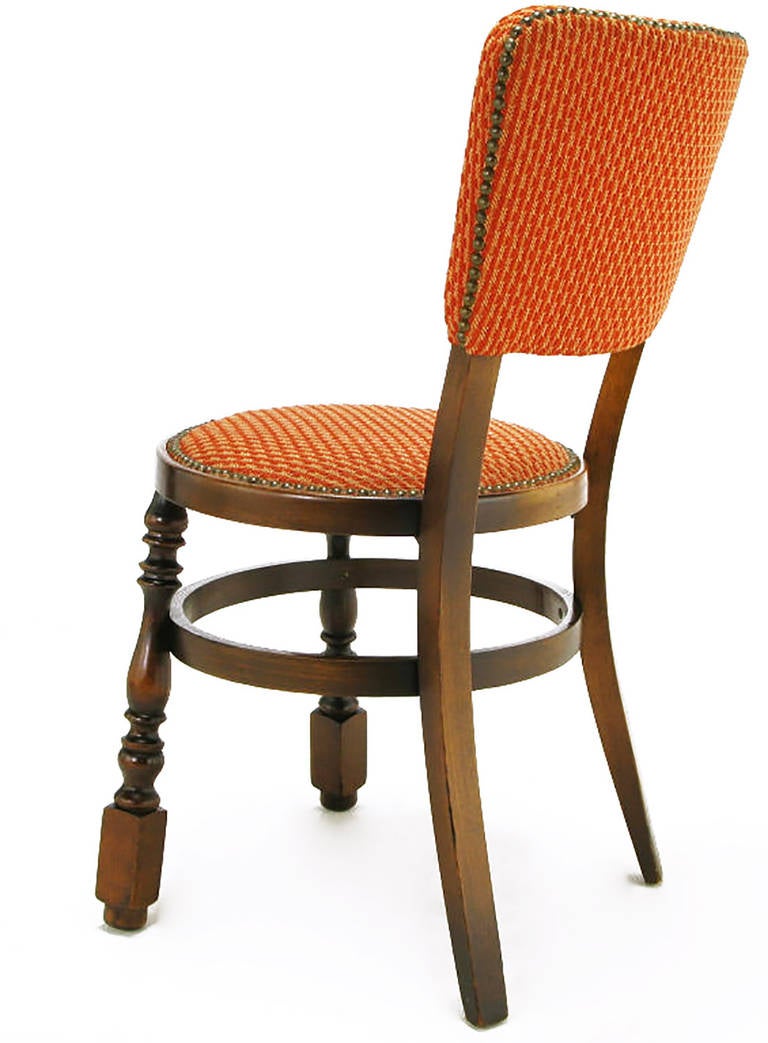 Mid-20th Century Four Uncommon Walnut and Persimmon Baluster Leg Dining Chairs with Round Seats