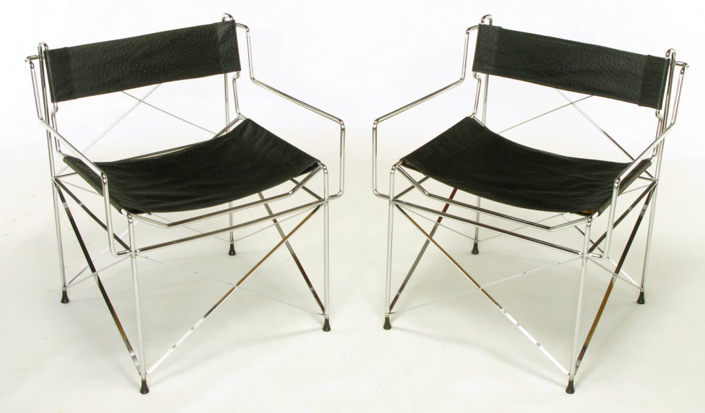Chrome architectural frames with intricate X-stretchers to all four sides and doubled on the back. Ostrich embossed leather sling seat and back. Very detailed chairs with black resin capped feet and brass spacers.