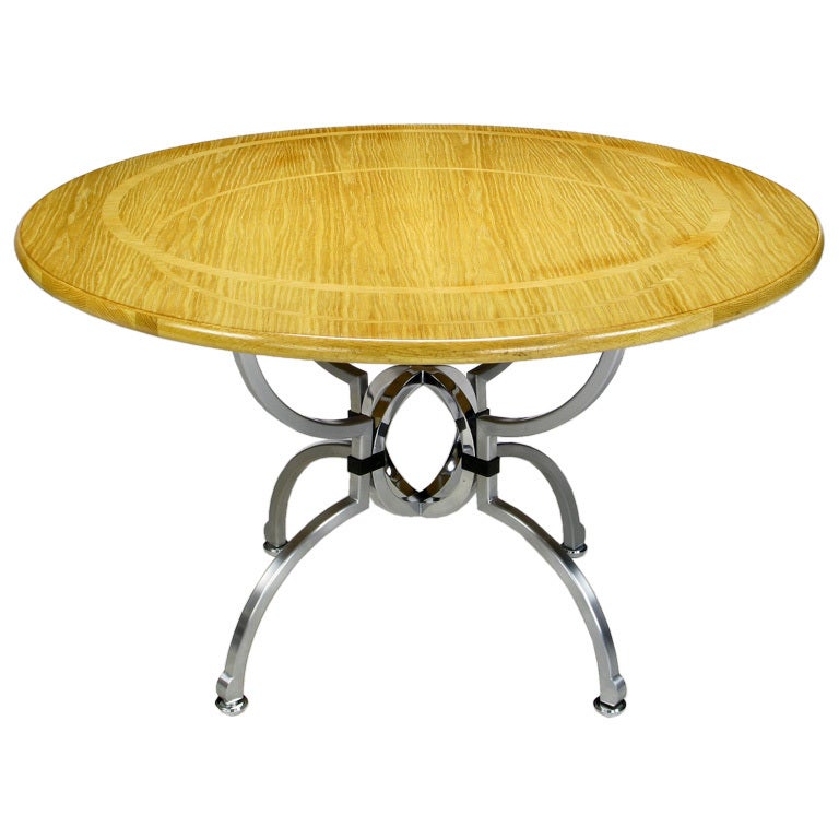 A part of Spectre's first 1986 collection for Century Furniture, this table is as stunning as it is rare. In Spectre's private conference room, adjacent to his office, an identical Eclipse table held center stage. Useful as a dining table, game