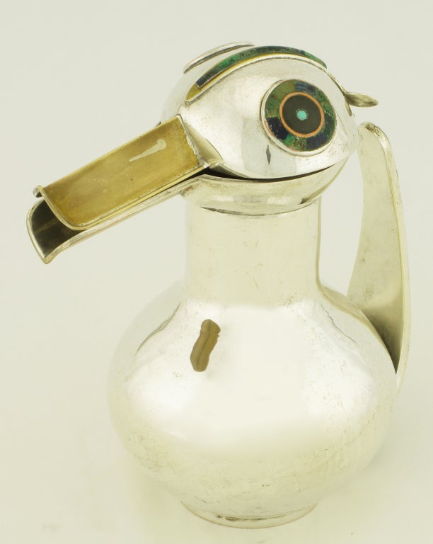 Los Castillos Mexican duck decanter or pitcher. Mixed metals of brass and silverplate, turquoise and mawsitsit inlaid stone. Signed Los Castillos, Hecho en Mexico.