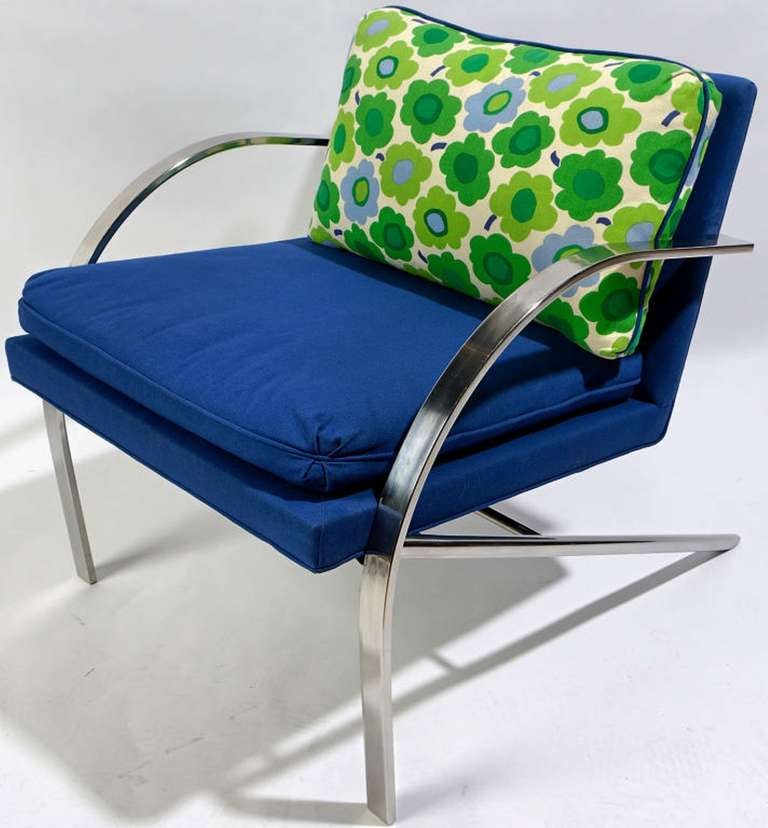 Excellent pair of original Arco chairs by Paul Tuttle for the Strässle Collection. Upholstered in a vintage royal blue wool blend, with back pillows of brightly colored Marimekko floral fabric of white, blues, and greens.

For best price and