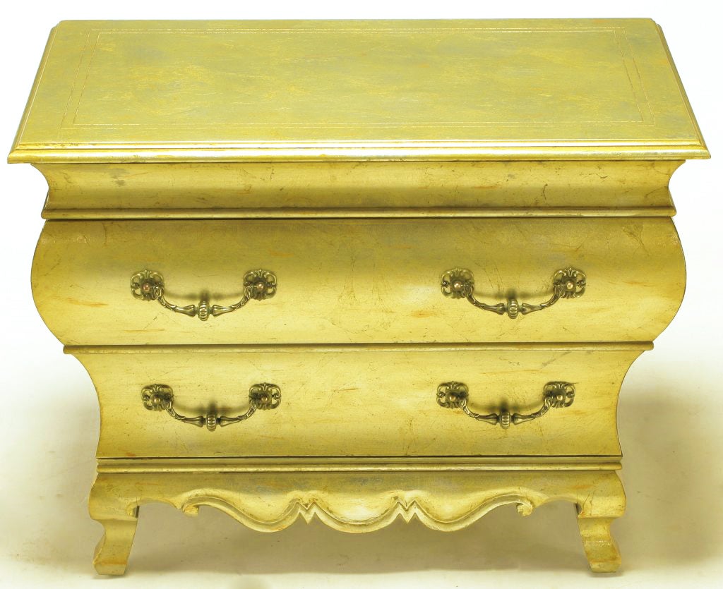 Mid-20th Century Pair Henredon Gold Toned Silver Leaf Bombe Two-Drawer Commodes
