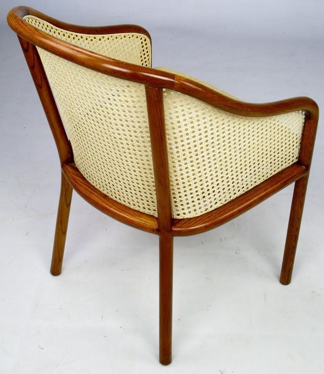 American Pair of Ward Bennett Oak and Cane Armchairs