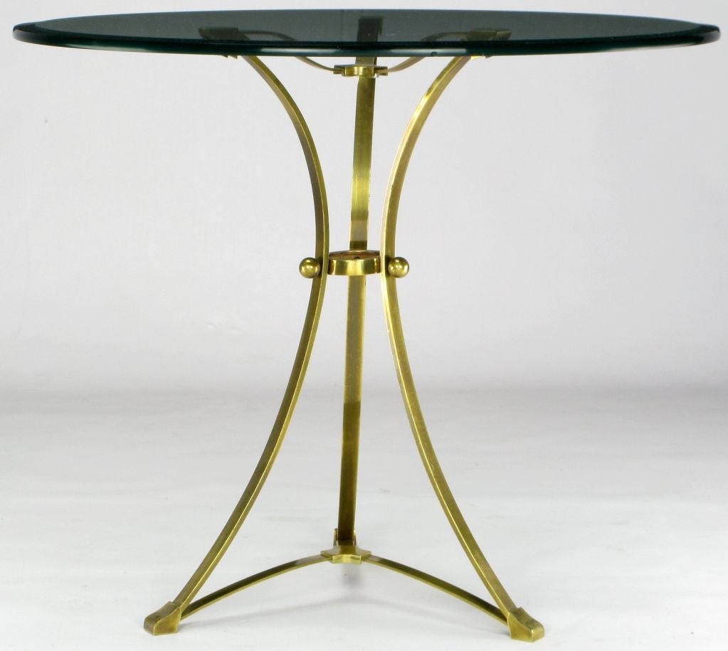 Elegant in design and stature, this architecturally inspired side table comes with a beveled 1/2' thick glass top. Similar in design to pieces by Maison Jansen, it could also serve well as an end table.