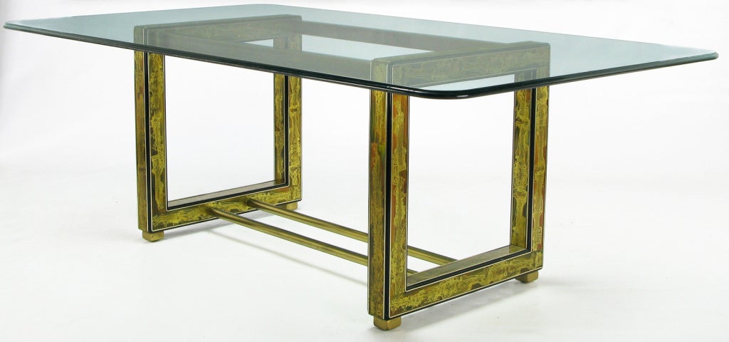 Geometric shaped Mastercraft dining table base in black lacquered wood with Bernhard Rohne acid etched brass panels. Each open square is supported by a pair of radiused edge brass blocks and connected together by two brass bars at the bottom and