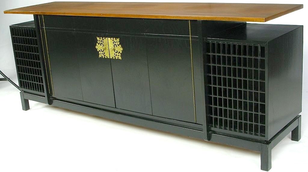 This Asian-influenced and very well constructed audio cabinet was designed in 1961 by furniture designer Peter Nishanian for BSA Sound Systems, a to-the-trade Manhattan custom furniture maker that specialized in fine cabinetry for audio equipment. 