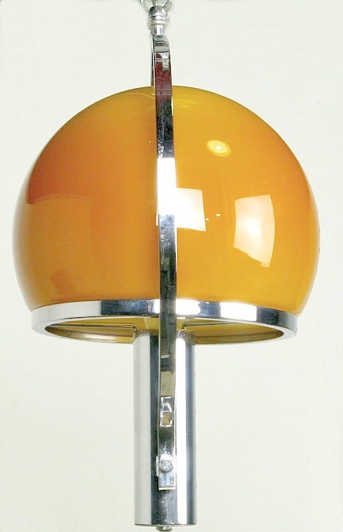 American Spherical Amber Cased Glass and Chrome Chandelier For Sale
